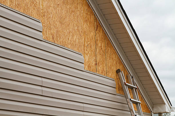 Professional Siding Contractor technician working in Commodore, PA